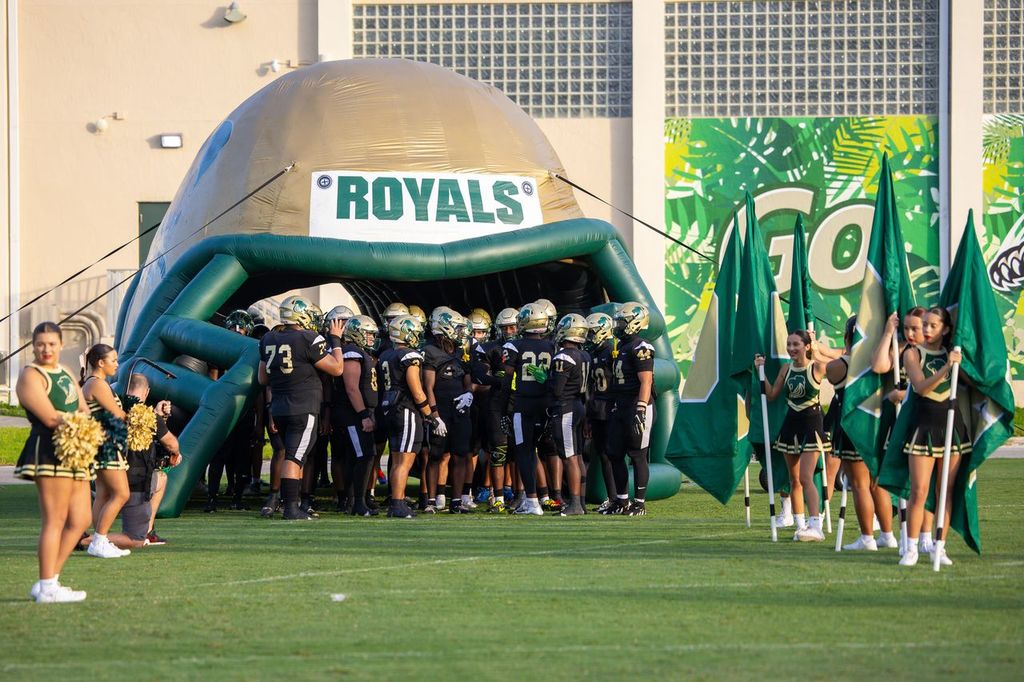 The ILS Football team emerges super hyped for their game.