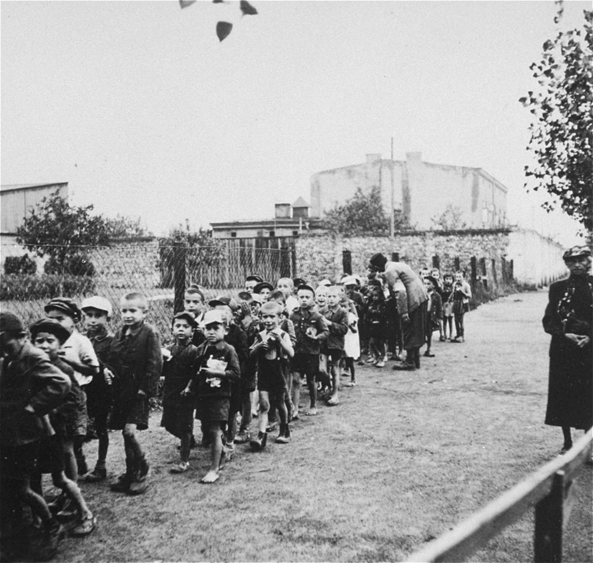 A line of innocent children in the Łódź Ghetto represents many of the victims of the Holocaust which took place between 1939 and 1945 during World War II