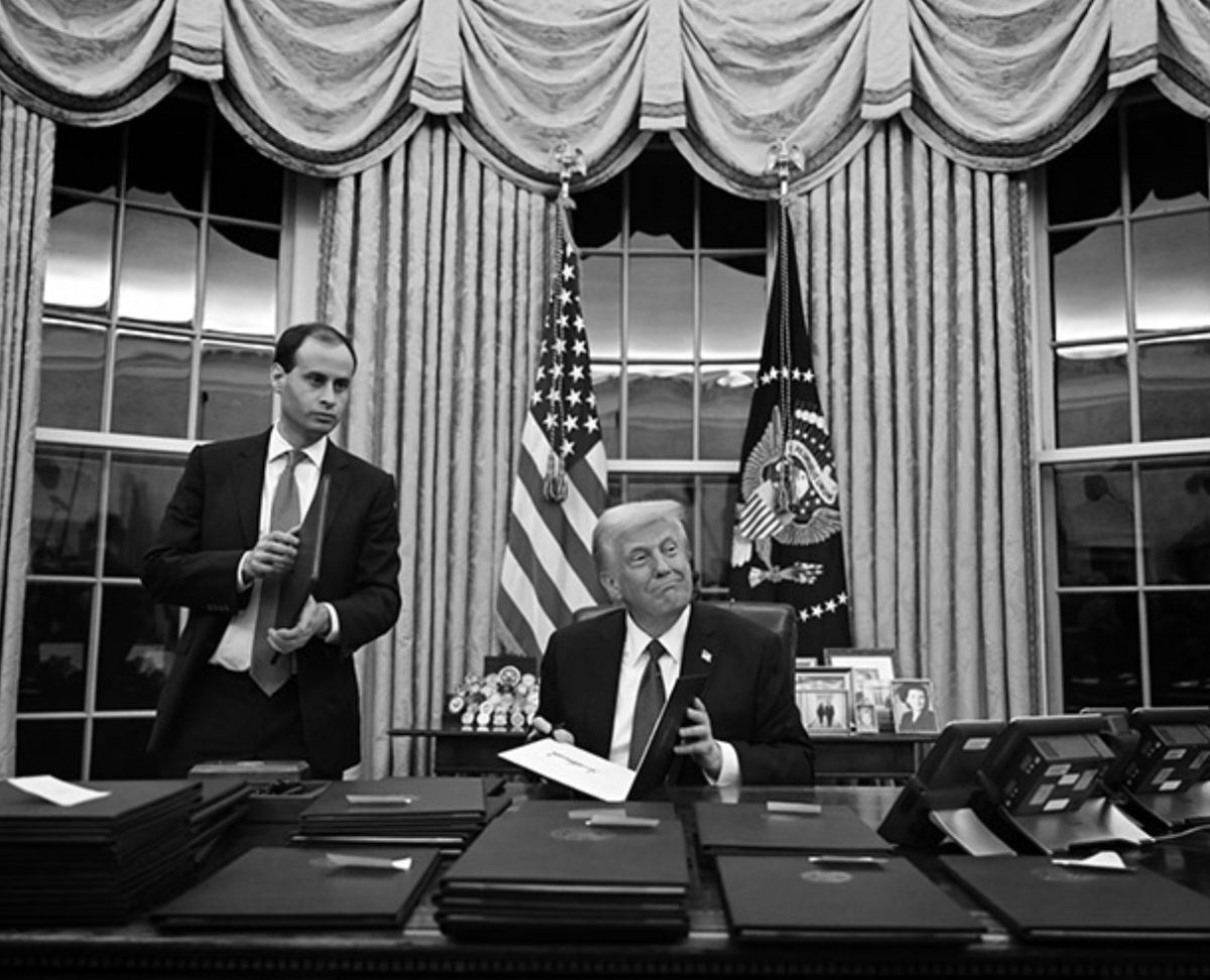 President Donald Trump signs executive orders in the Oval Office on January 20. Since October 1, there has been a government shutdown.