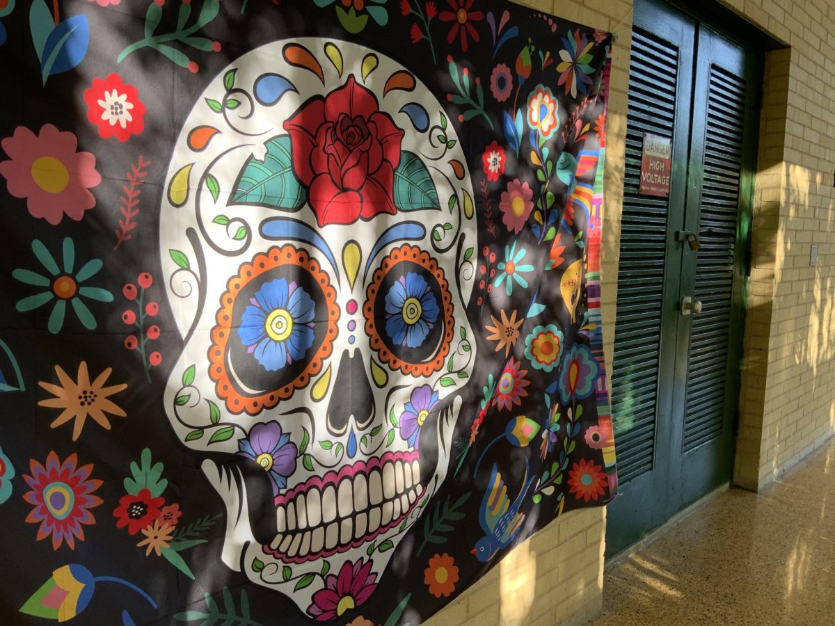 An image of the Day of the Dead, an annual celebration in Mexico, represents one of the many colorful decorations around school placed to celebrate Feria Latina.