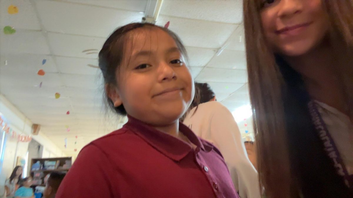 Manela is all smiles during the ILS SALTT visit to La Escuelita to celebrate Halloween with the children.