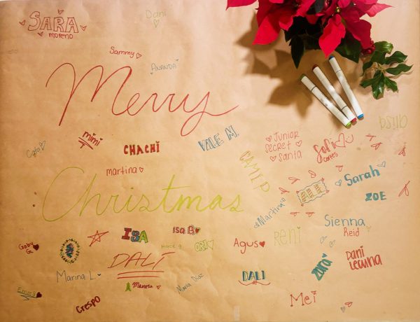 This signed butcher paper represents the junior year Secret Santa featuring the names of most of the girls in this year's senior class.