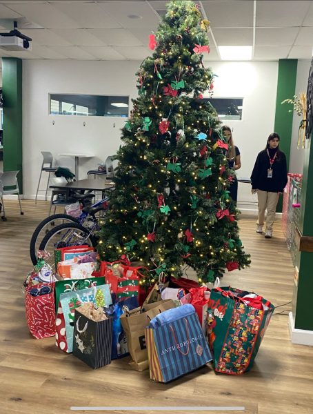 The Angel Tree begins to be filled with the donations from the ILS community.