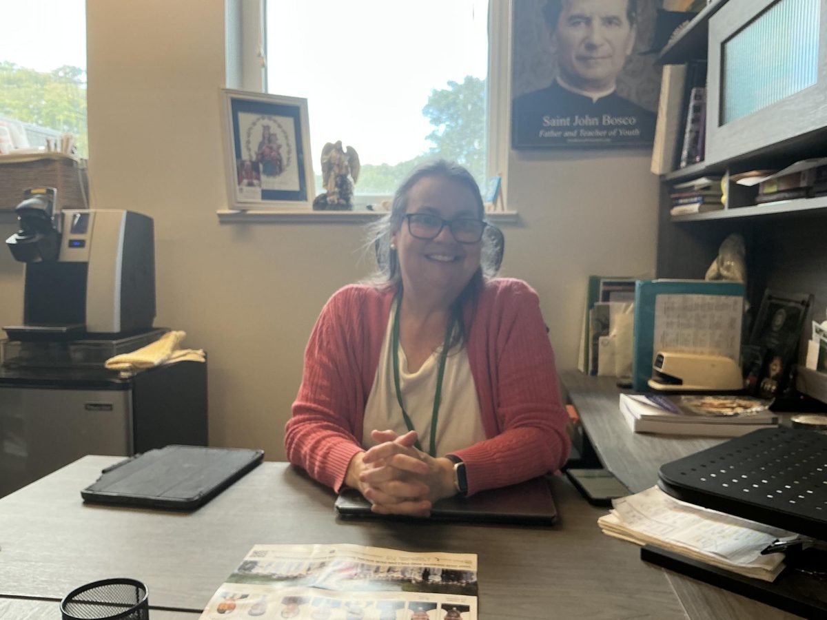 Dr. Cristina Lopez-Hernandez prepares for her daily class.