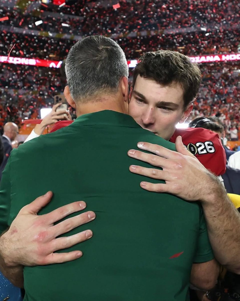 UM Coach Mario Cristobal congratulates IU Quarterback Fernando Mendoza. Coincidentally, both graduated from Christopher Columbus High School.