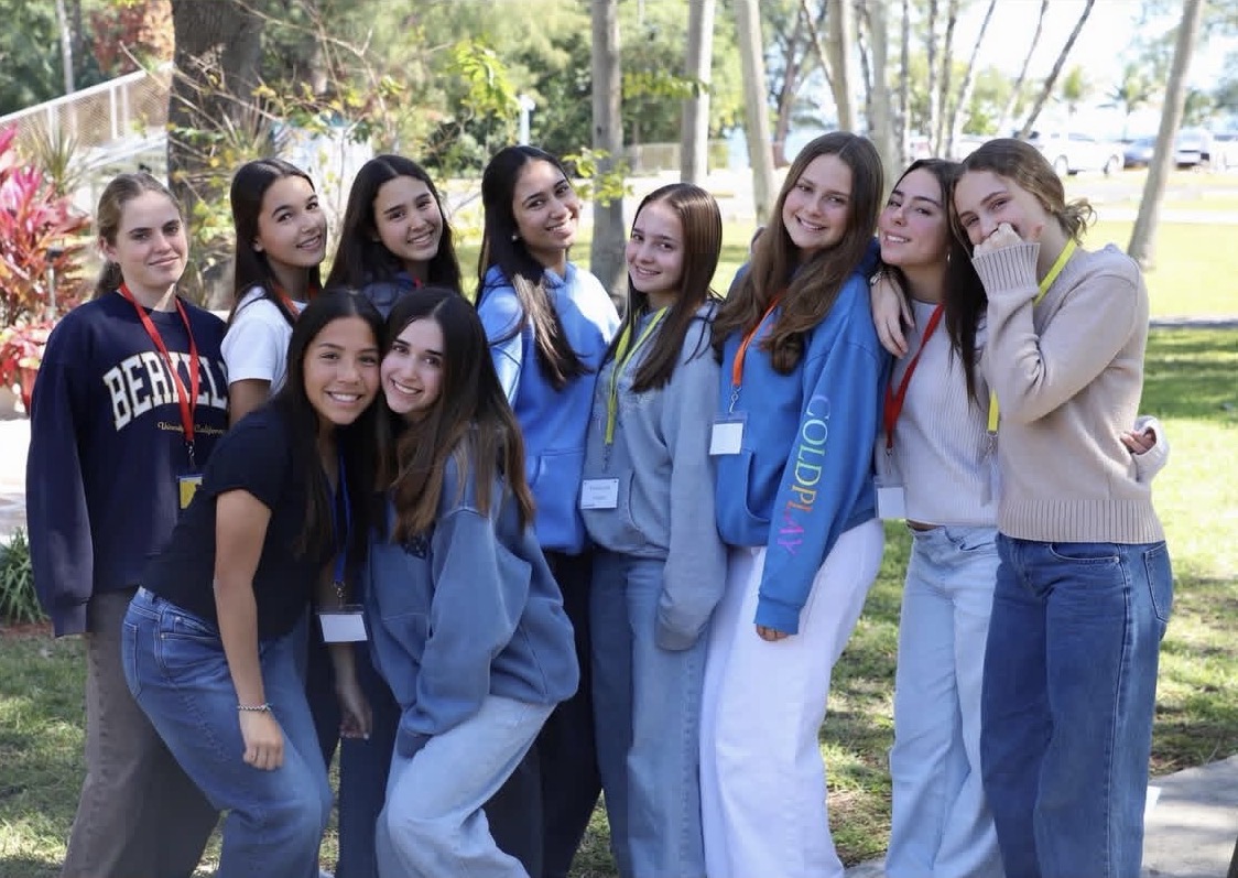 Several sophomore girls spend time outside together, bonding on the second day of the Ignite retreat