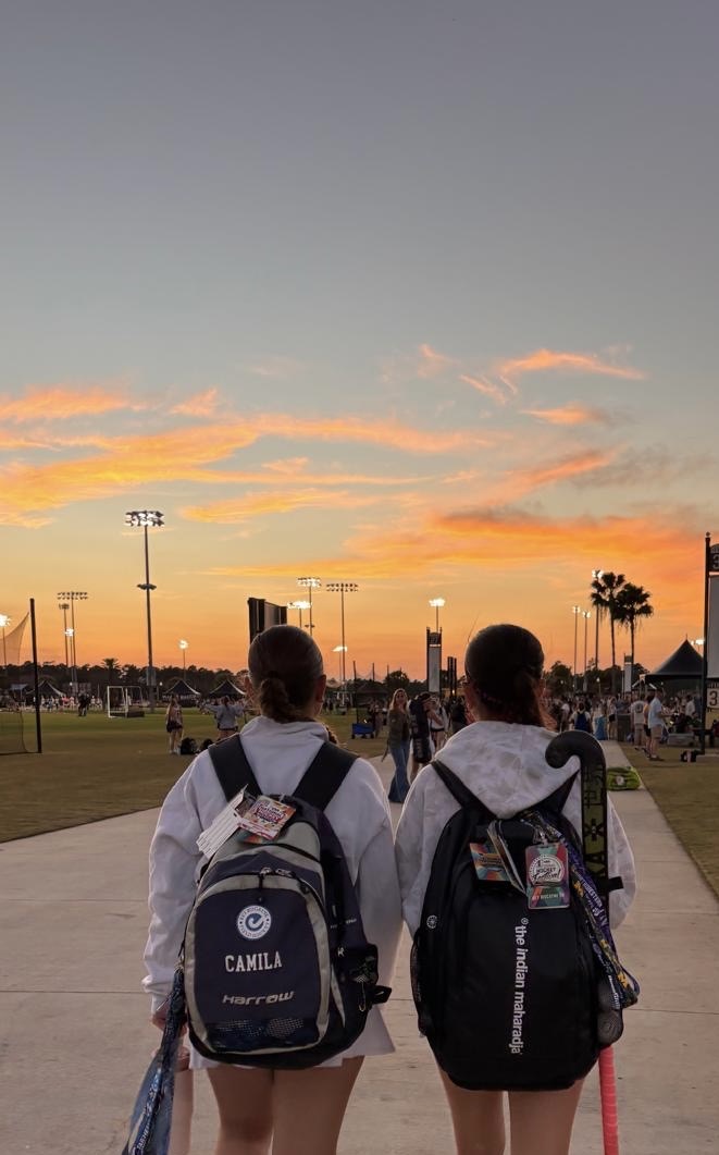 Players walk off into the sunset after an arduous day of competition.