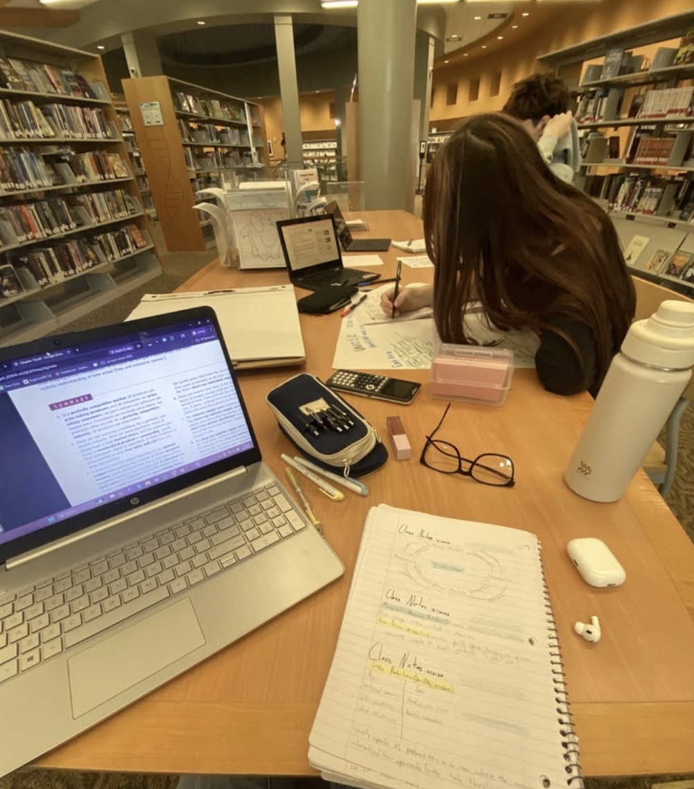 This image is representative of the millions of American teens studying for their classes trying to keep up with multiple tasks.