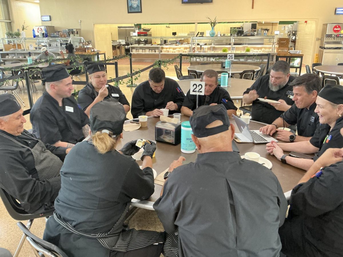 Sage members enjoy breakfast together after students leave from breakfast. 