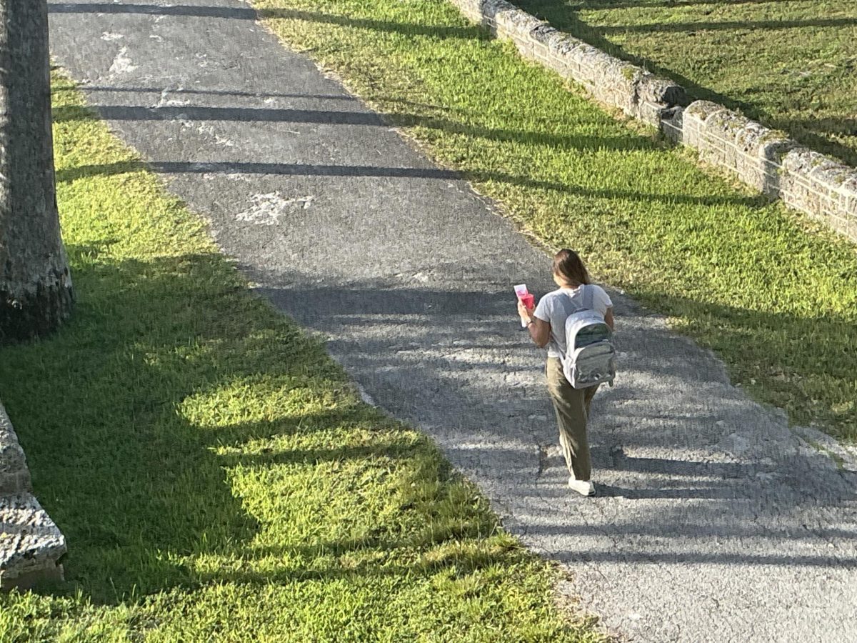 ILS teacher Ms.Church walks home after a long day of lecturing students on Catholic theology.