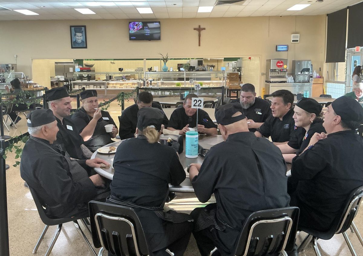 ILS Sage Dining Crew sharing breakfast Monday morning before preparing lunch for the school. 