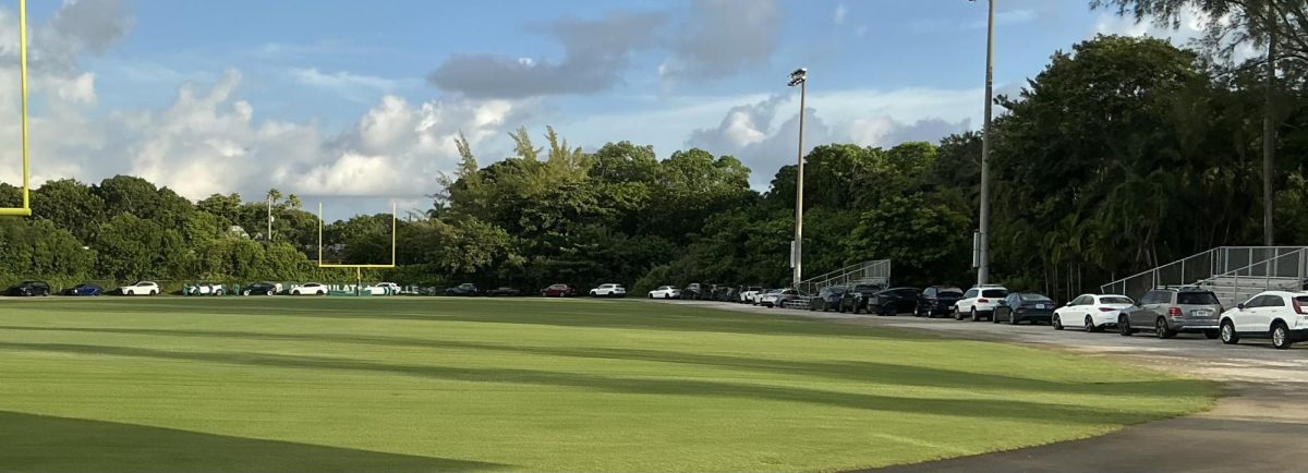 Over 20 cars of ILS students are required to park on the track field as construction on campus remains unfinished.
