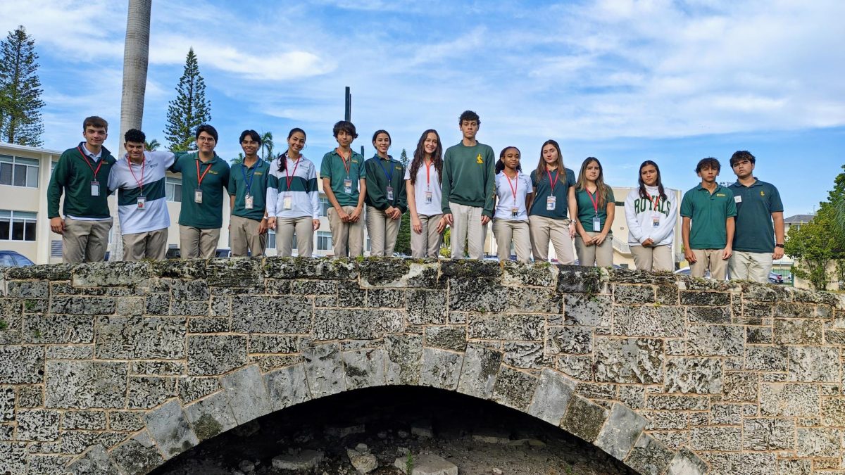 The 2026-2027 Journalism I Section 2 class pose on the bridge with one of their editors, Vittorio Buttice-middle-who edits the Opinion section.