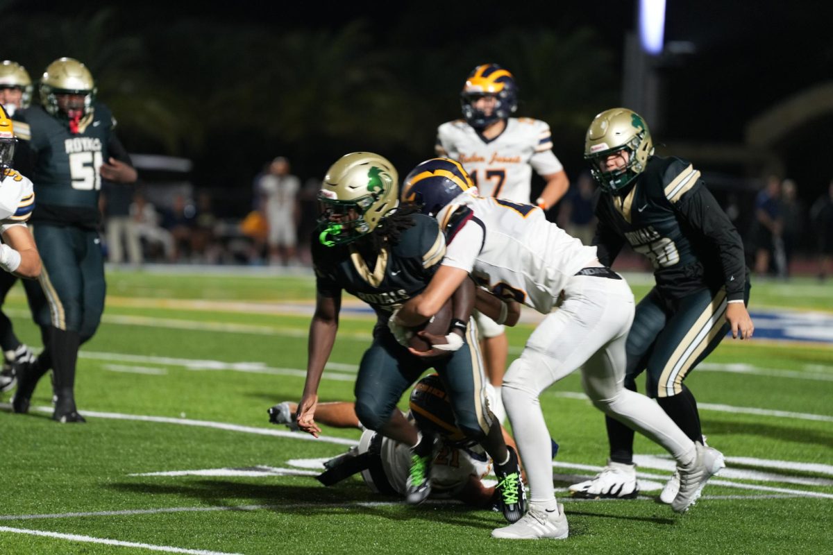 At last season's game versus Belen Jesuit, members of the ILS Varsity Football team demonstrate their strength and perseverance.