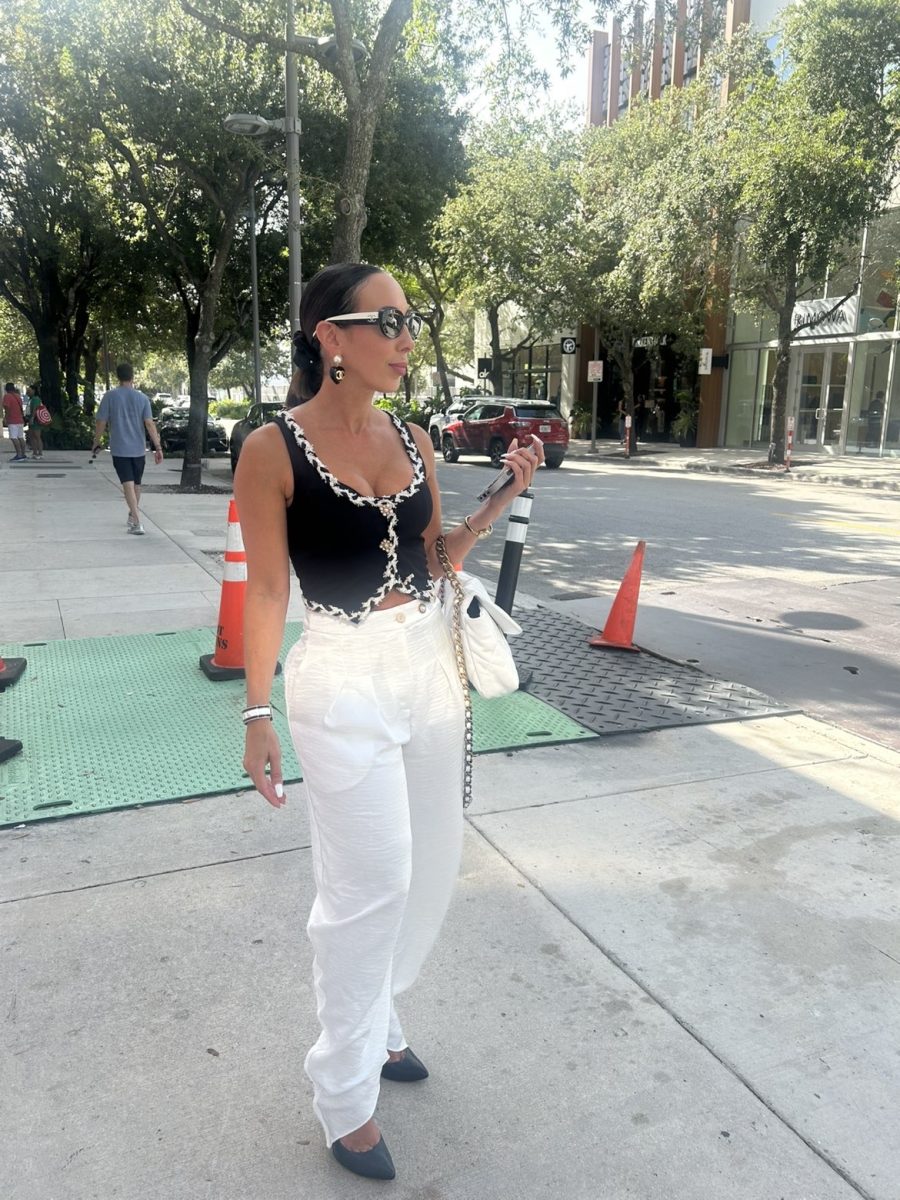 Wearing full Chanel, Raquel’s take on modern fashion is that barrel jeans are cool when styled right though most of the time are unflattering.