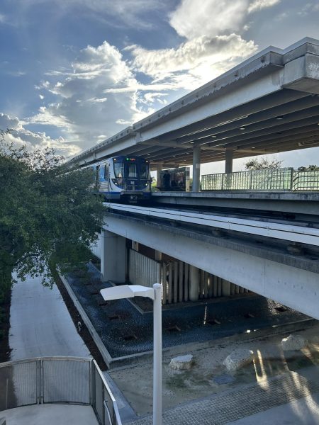 This image of the Metrorail features of the northbound train approaching the University station in the heart of Coral Gables.