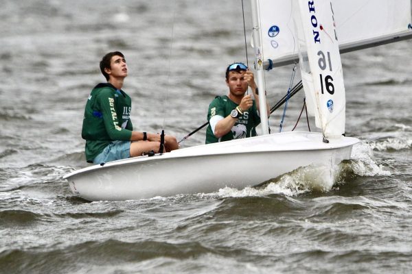 Alejandro Escudero and a fellow sailor brave the wind and waves at a recent Sailing team competition.