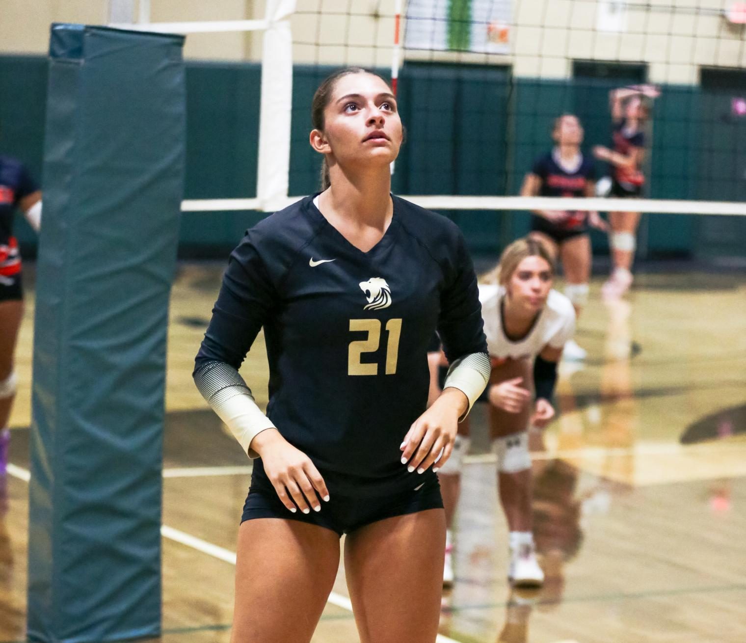 Alexandra Gonzalez Casar warms up while focusing on competing for a win or go home first round quarterfinal game.