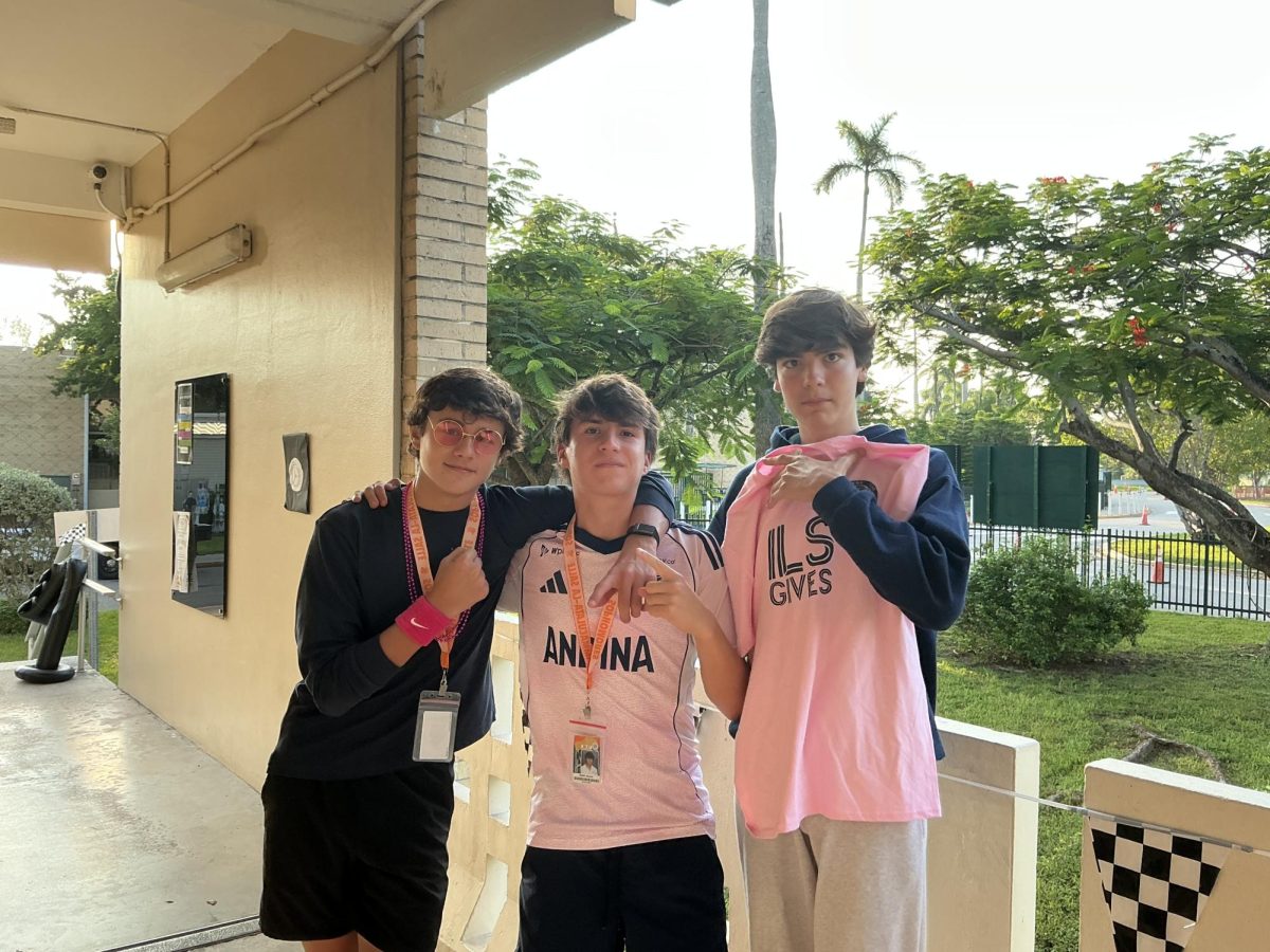 Three best friends showing their school spirit together. 