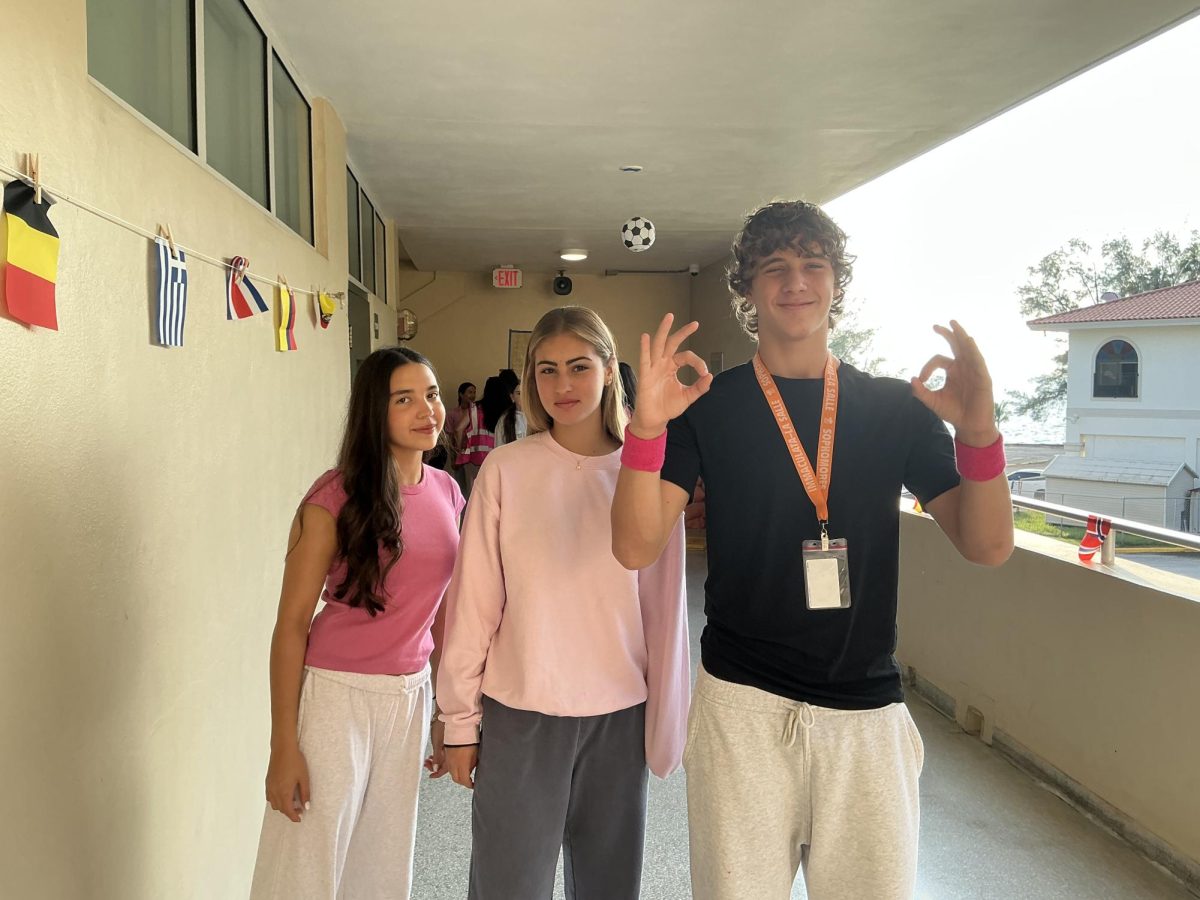 Friends bond over their pink outfits. 
