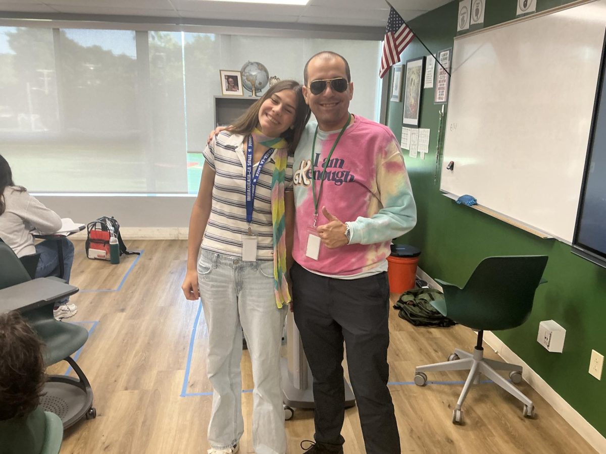 History teacher Mr. Galguera and juniorJosefina Scherzer show off their mismatched clothes.