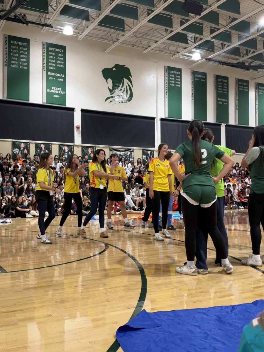 The juniors perform their World Cup Homecoming skit while wearing predominantly Colombia jerseys.