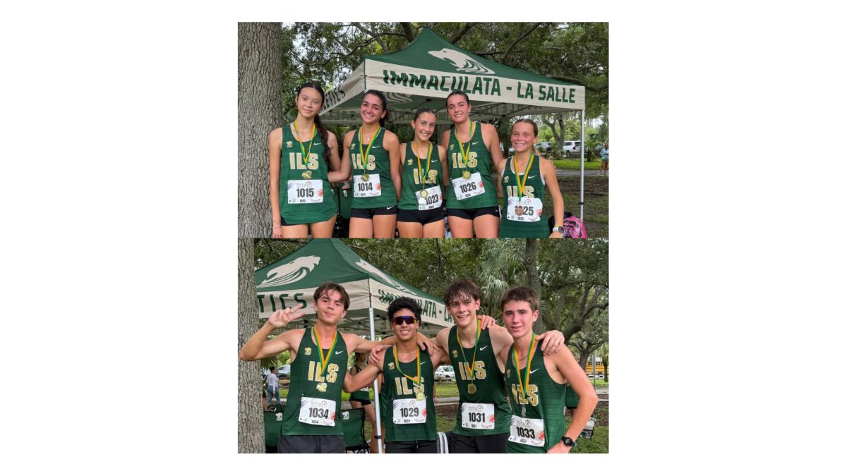 ILS Cross Country runners at their meet, wearing medals awarded to athletes who placed in the top 20.