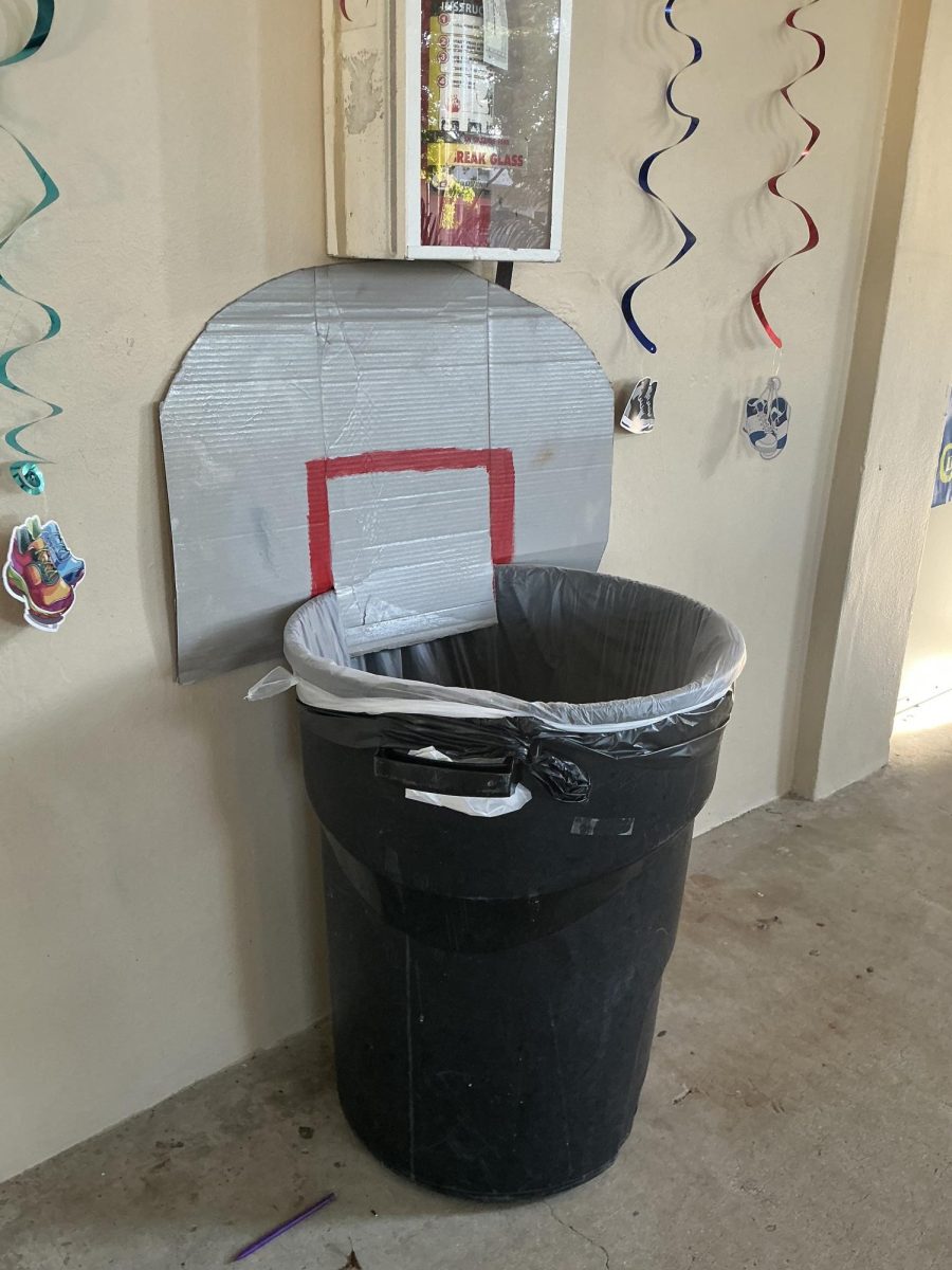 A trash can gets turned into a basketball net in the 600 building.