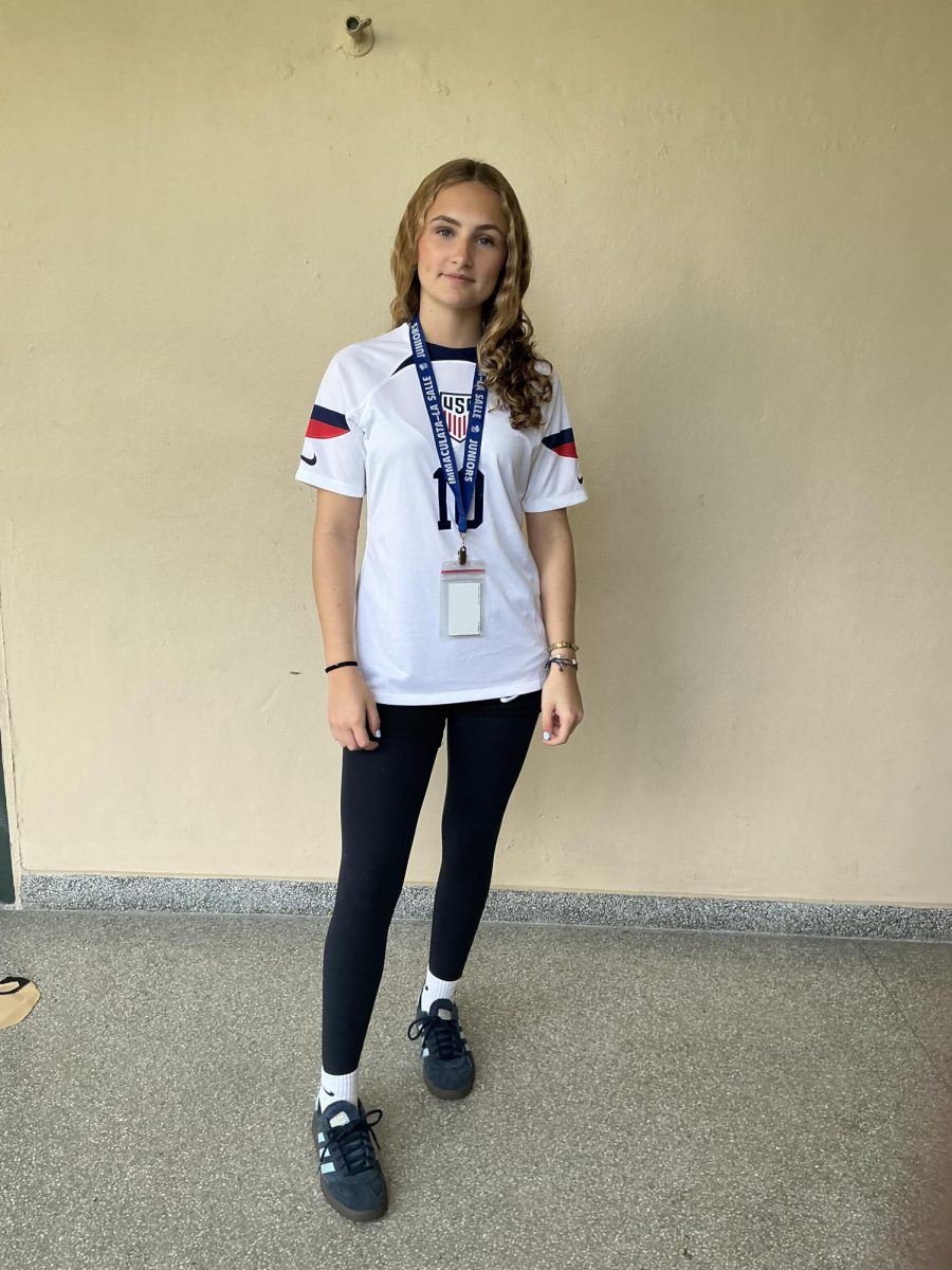 Junior Sophie Garcia poses for a picture while wearing a World Cup jersey.