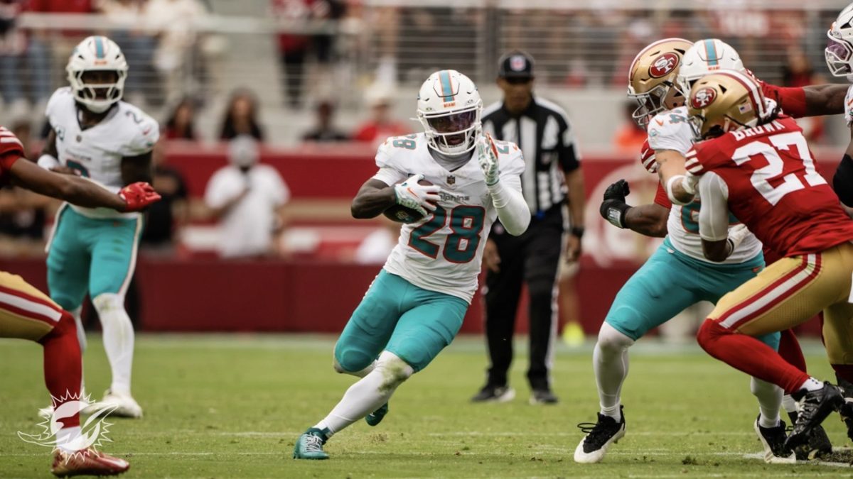 Devon Achane runs through the 49ers defense