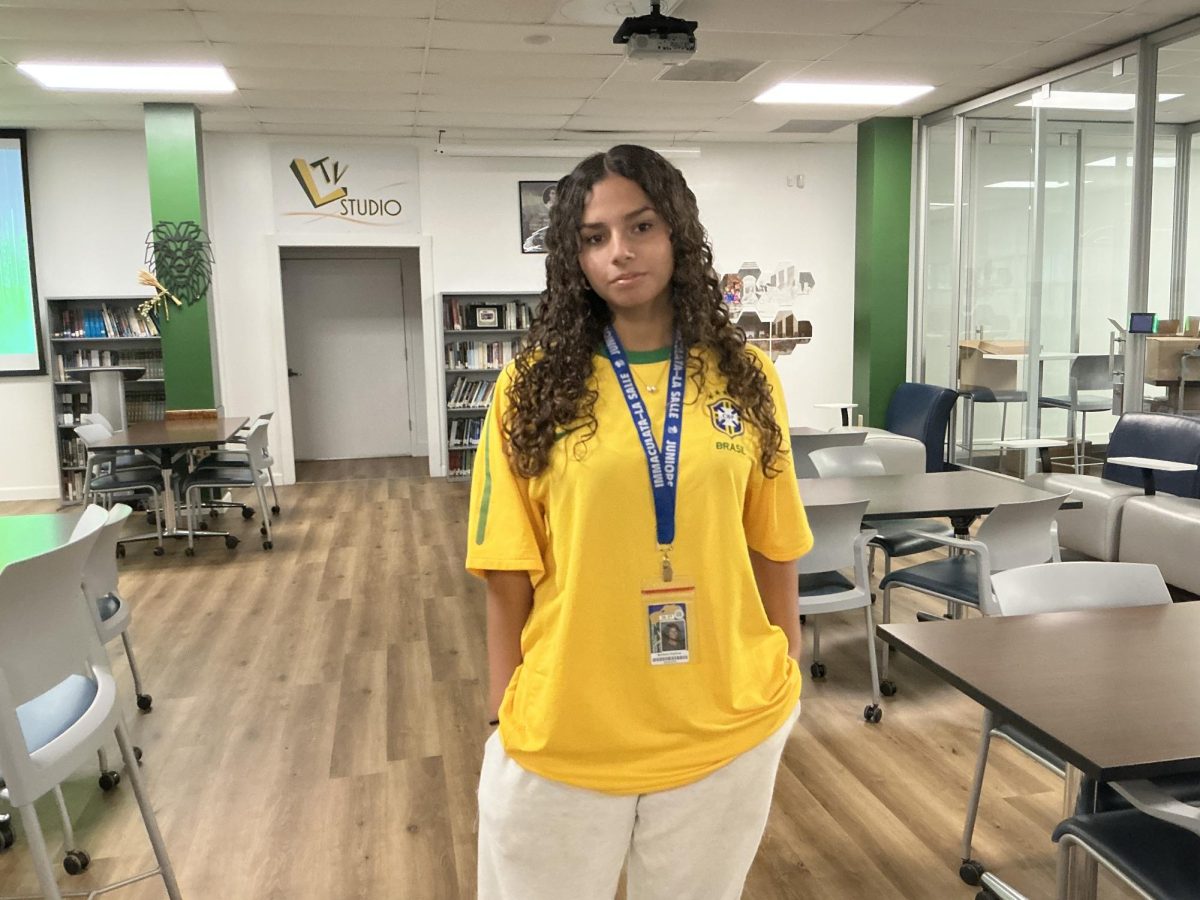 A junior named Barbie shows off her Brazilian pride.