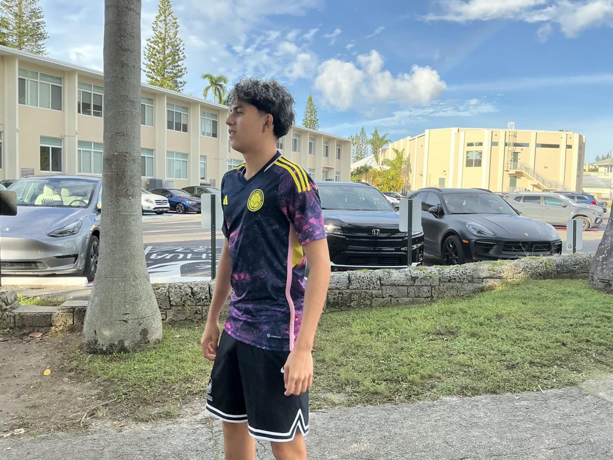 A junior named Michael likes his Galaxy soccer jersey.