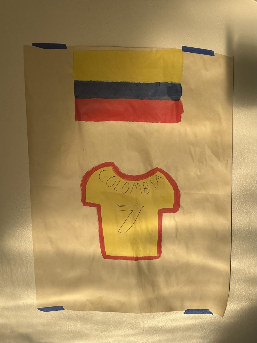 Handmade Colombia soccer jersey poster decorates the main building hallway.