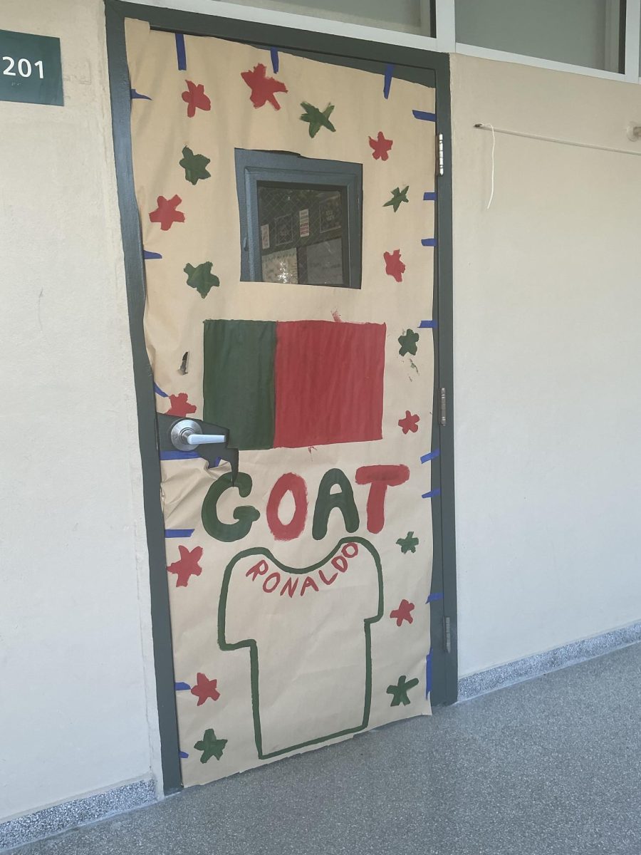 This door covering declares who is the greatest soccer player of all time.