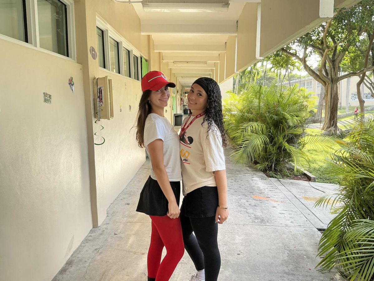 Seniors Natalie Reyes and Miyana Bastien show off their school spirit wearing F1 outfits in preparation for the Pep Rally. 
