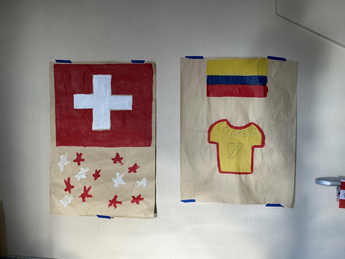 Colombia and Switzerland flags represent the FIFA World Cup quarterfinal match which knocked Colombia out of their last World Cup with James Rodriguez in the third floor of main building. 