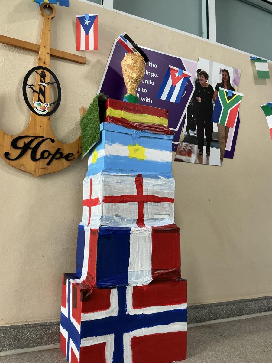 The DIY FIFA World Cup Trophy features the top of the finalists and semifinalists of the competition decorates the middle of the third floor main building stairs. 