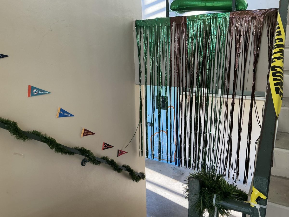 NFL team flags and colorful streamers cover the 800-900 stairway decorated by sophomores.