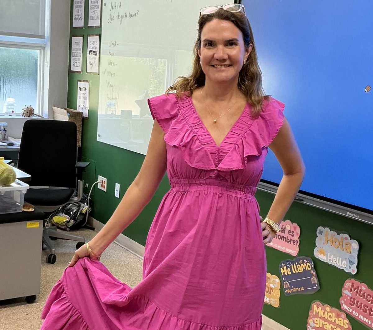 Mrs. Mavelys De La Rosa shows her support for Breast Cancer Awareness by wearing pink.
