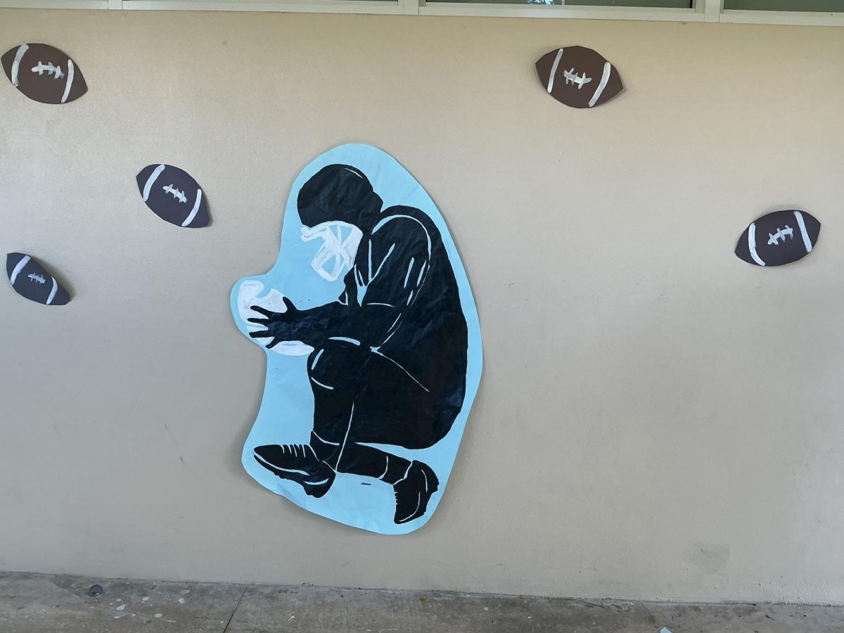 The ILS sophomores painted a cut out of a football player surrounded by footballs nailing the “Super Bowl” theme.