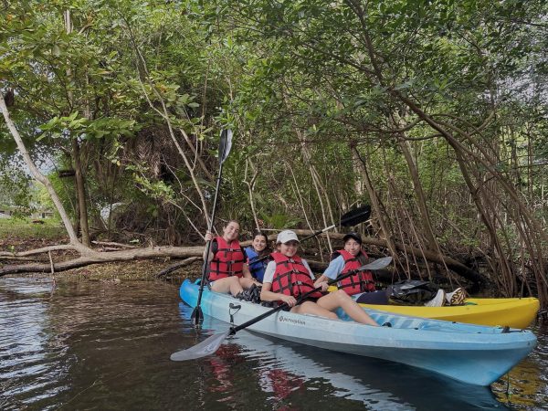 ILS seniors (Julie Alemany, Alessia Cababie, Valentina Bustos, and Valentina Pizarro) get ready to kayak .