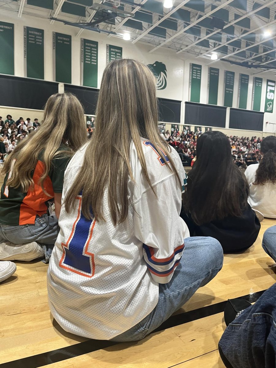 Sophomore Daria Pereira watches the junior skit.